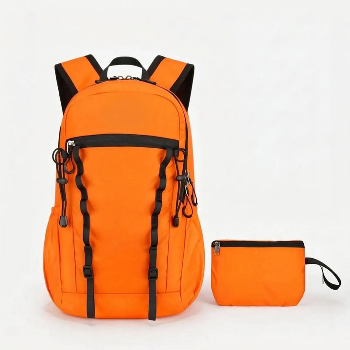 Small folded hiking backpack easily fits into luggage, perfect for on-the-go travelers.