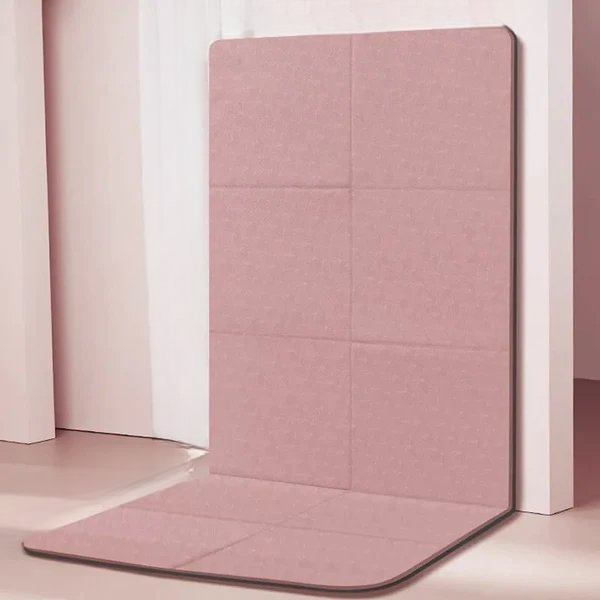 Durable TPE foldable yoga mat, thick and non-slip for safe workouts. Portable exercise accessory for any home gym.