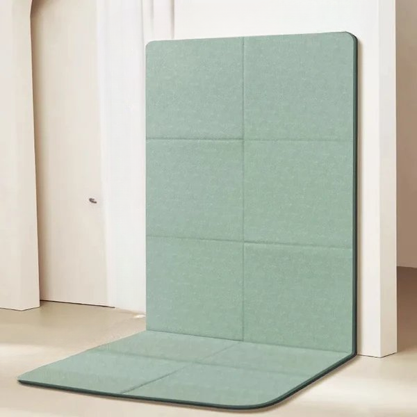 Easy-to-fold thick TPE yoga mat for portable fitness. Non-slip surface ensures stability & comfort for unisex exercises.