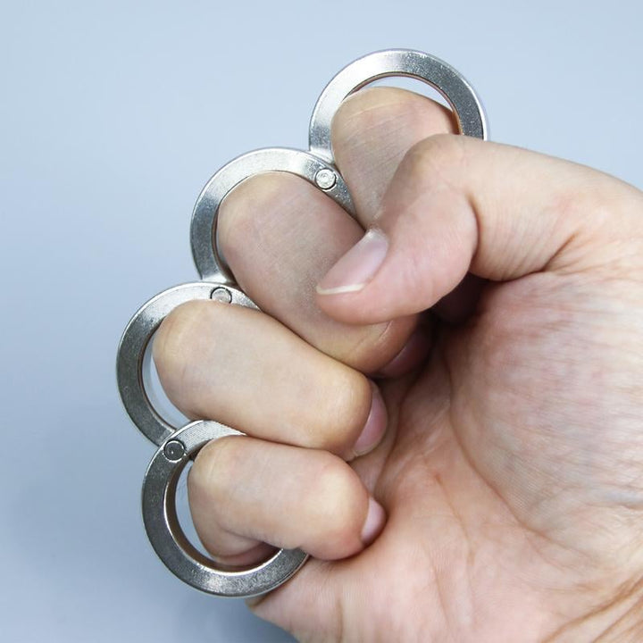 Unisex folding four-finger ring for anxiety relief, a discreet stress relief fidget tool for everyday calming and focus.
