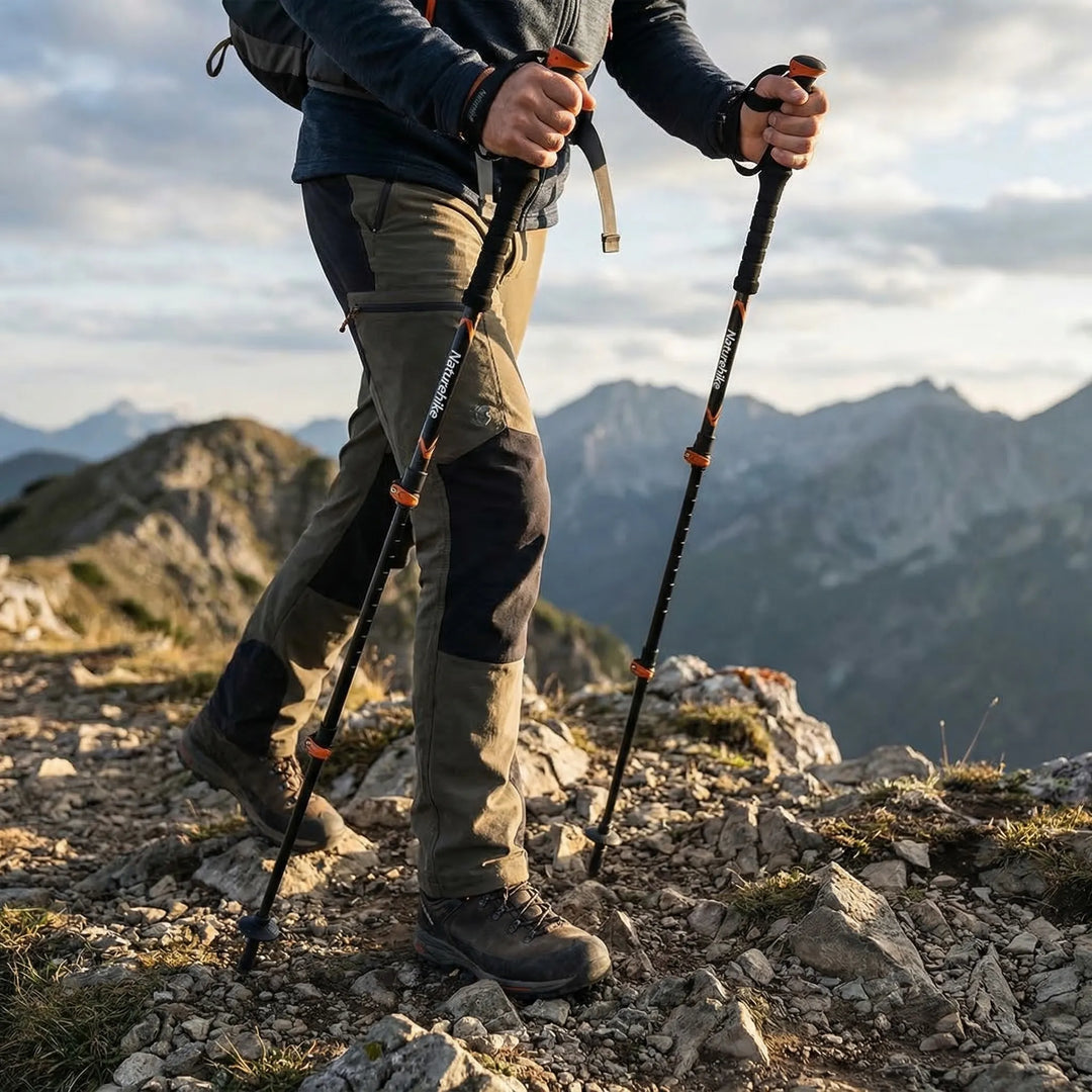 Unisex folding trekking pole, compact & adjustable. Ideal for hiking, trail adventures & outdoor enthusiasts.