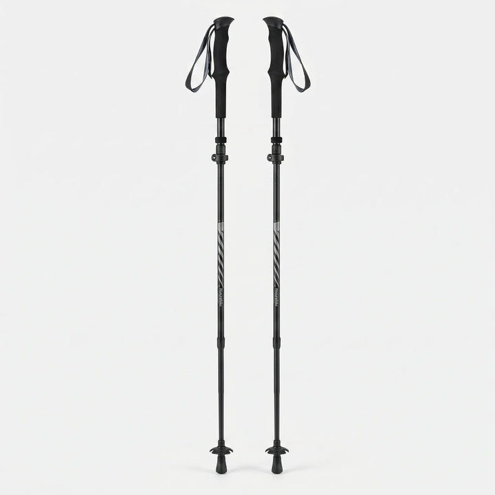 Pair of unisex folding trekking poles, lightweight & adjustable for all hikers on mountain & trail adventures.
