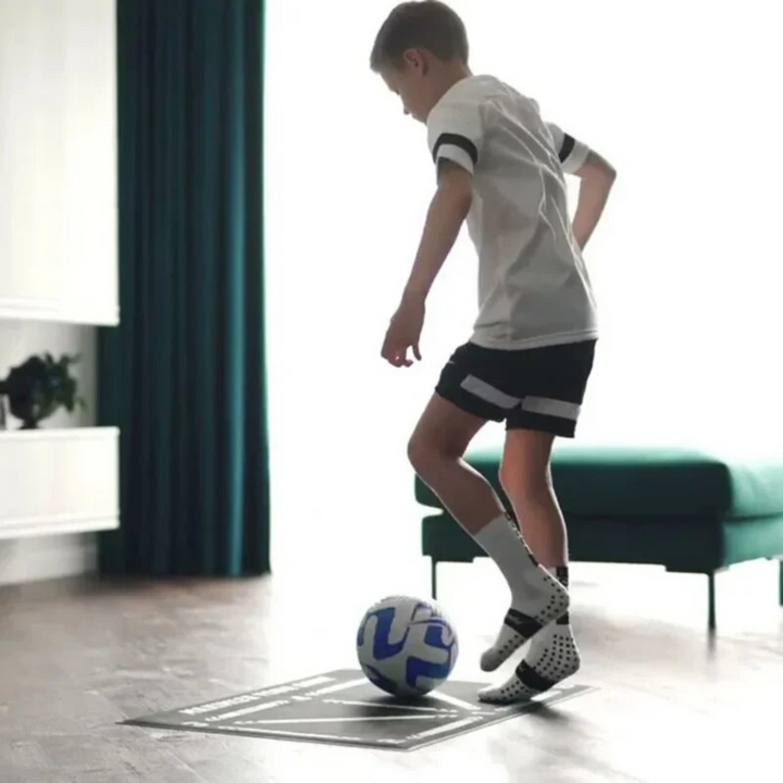 Close-up of a football training mat, showcasing its non-slip surface for intensive soccer footwork drills.
