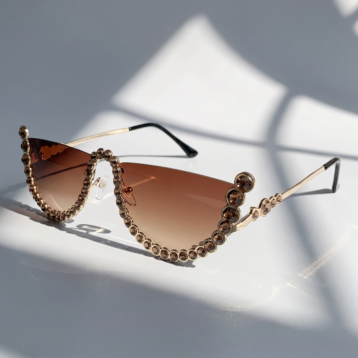 Modern green frameless oval sunglasses, high-quality unisex eyewear offering full UV400 protection.