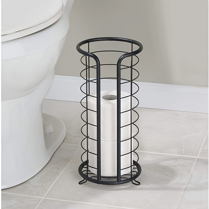 Sleek 'PaperNest' freestanding toilet paper holder in stainless steel, ideal for any modern bathroom accessory collection.