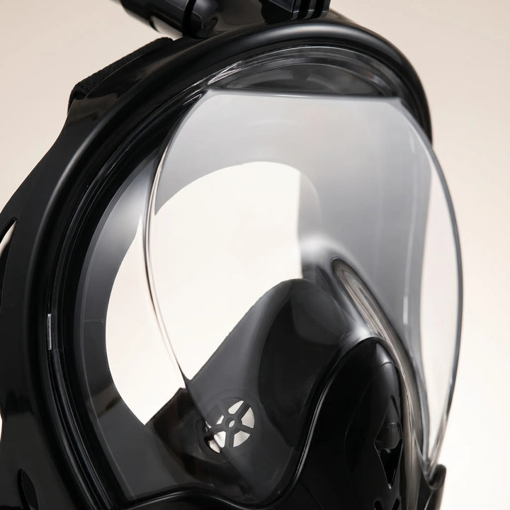 Full-face snorkel mask with integrated camera mount for capturing underwater videos & photos on vacation.