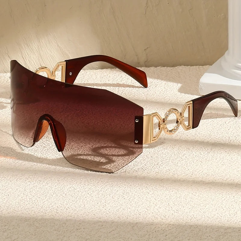 Unisex fashion eyewear: futuristic shades with colorful gradient lenses, bold design, and stylish gold temples.