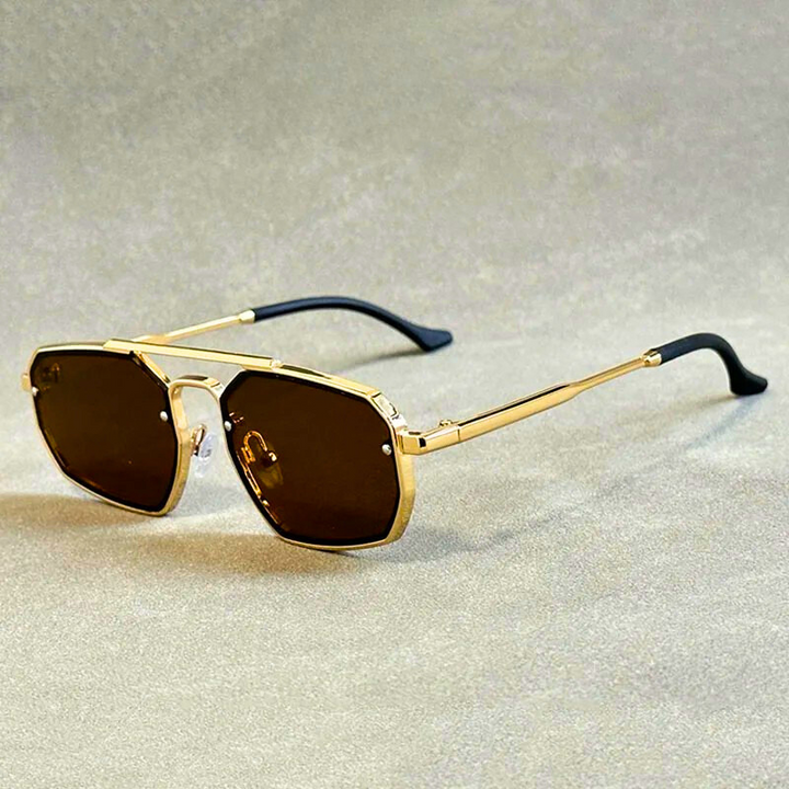 Close-up of modern geometric aviator sunglasses, showcasing the sleek metal frame and dark UV protective lenses.