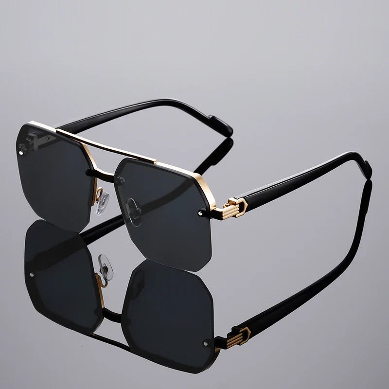 Lightweight rimless geometric sunglasses with 100% UV protective lenses for all-day wear.