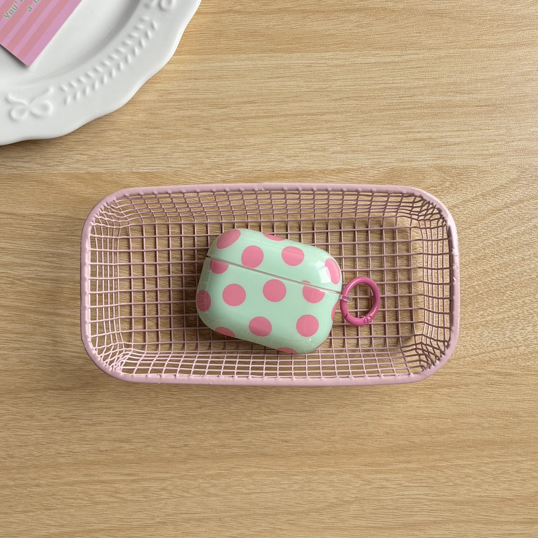 Glossy polka dot AirPods case with a ring. Protective & stylish wireless earbuds cover, a unisex accessory.