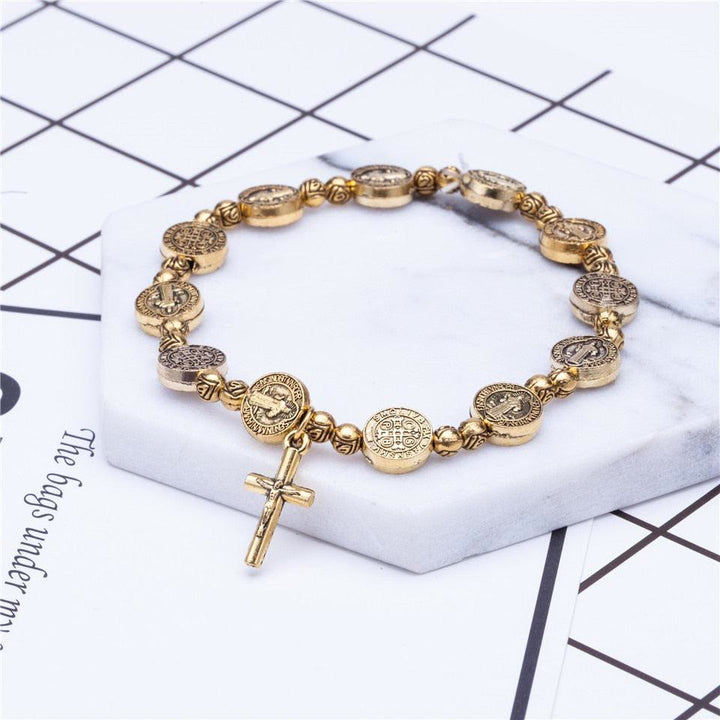 Elegant gold & silver Christian cross bracelet, a perfect spiritual gift or unisex faith accessory.