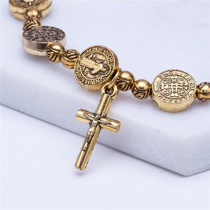 Simple gold & silver tone Christian cross bracelet, versatile unisex jewelry for everyday spiritual style.