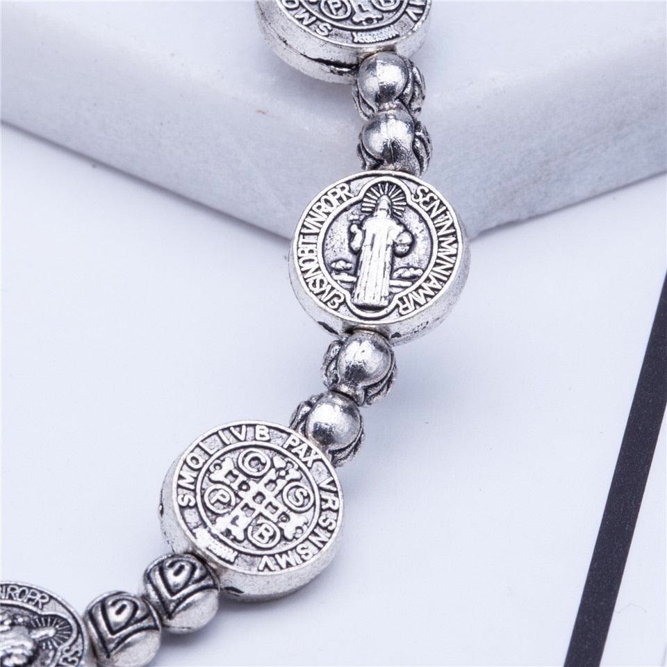 Detailed gold & silver Christian cross bracelet, a meaningful unisex spiritual gift and faith symbol.