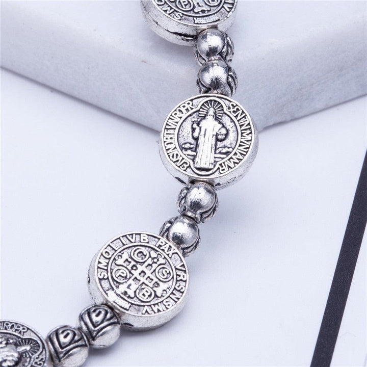 Detailed gold & silver Christian cross bracelet, a meaningful unisex spiritual gift and faith symbol.