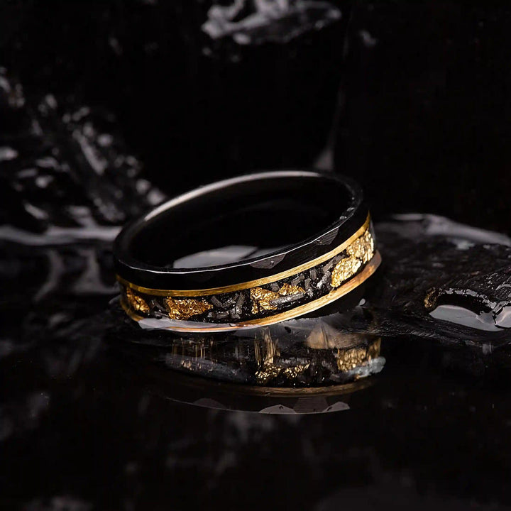 Women's Black Meteorite Tungsten Ring with intricate golden leaf, durable and unique design.