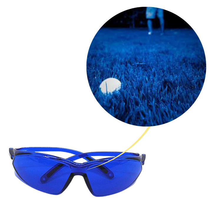 Golfer wearing golf ball finder glasses, spotting a lost ball easily. Sports glasses with UV protection for outdoor play.