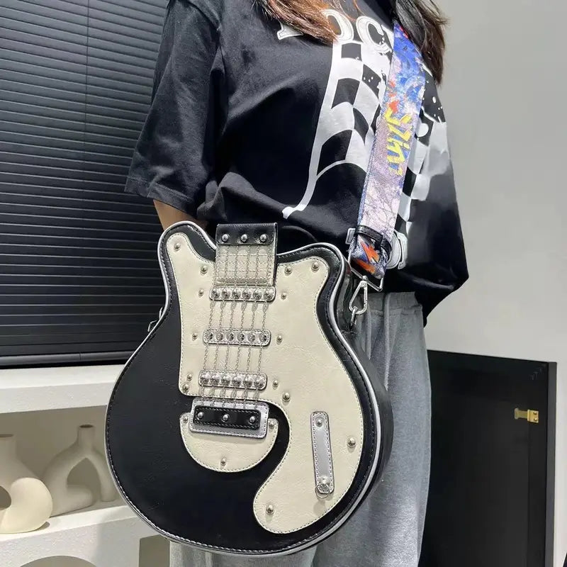 Edgy guitar shoulder bag, perfect for expressing your music-inspired style.