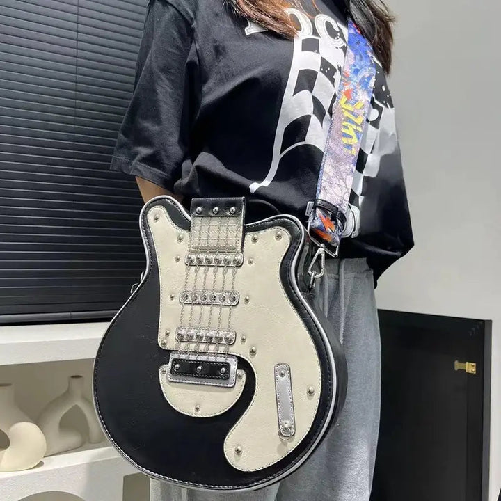 Edgy guitar shoulder bag, perfect for expressing your music-inspired style.