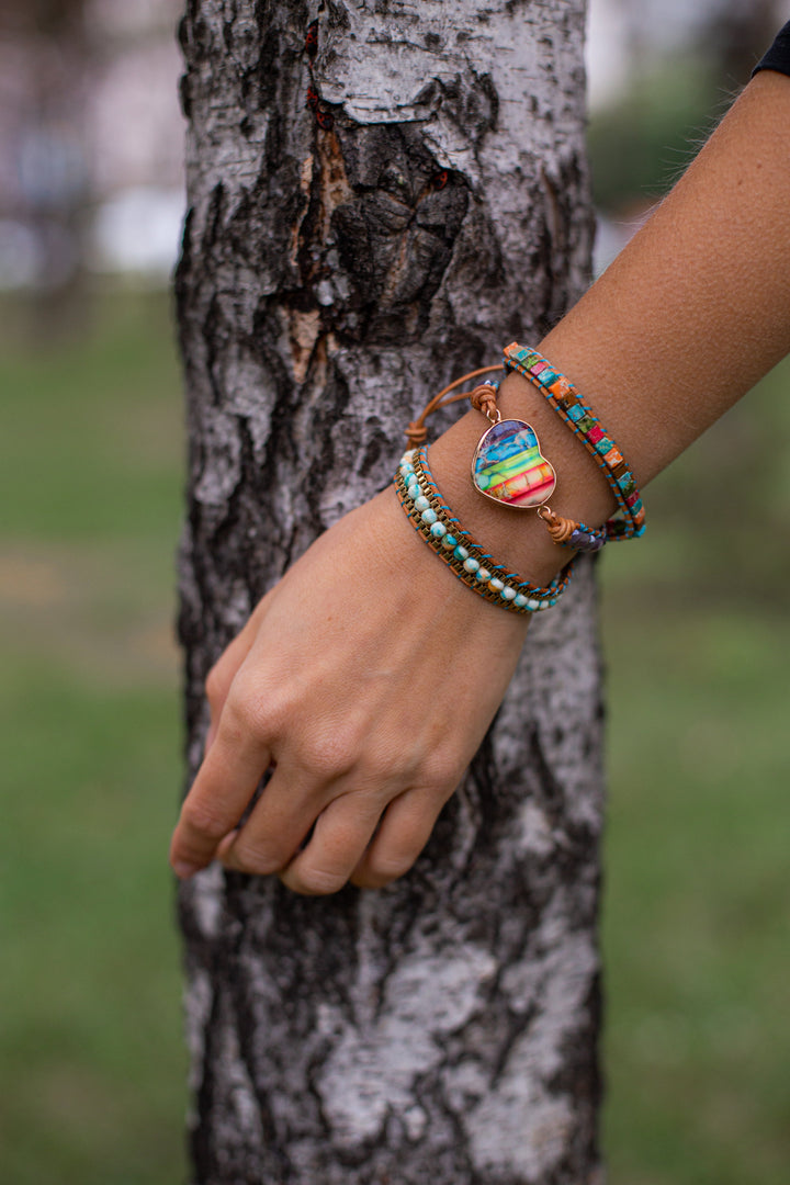 Close-up of unisex chakra energy wrap bracelet with crystal and jasper stones