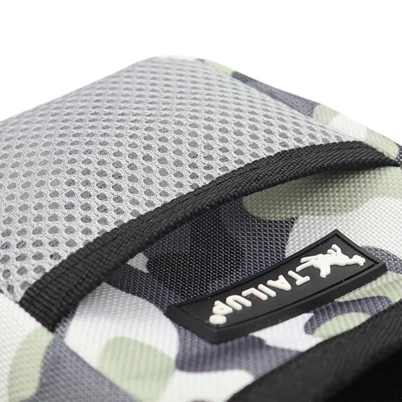 Black hands-free dog training bag with multiple pockets, essential for obedience gear.