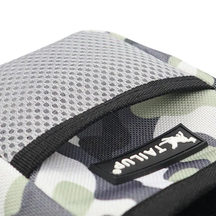 Black hands-free dog training bag with multiple pockets, essential for obedience gear.
