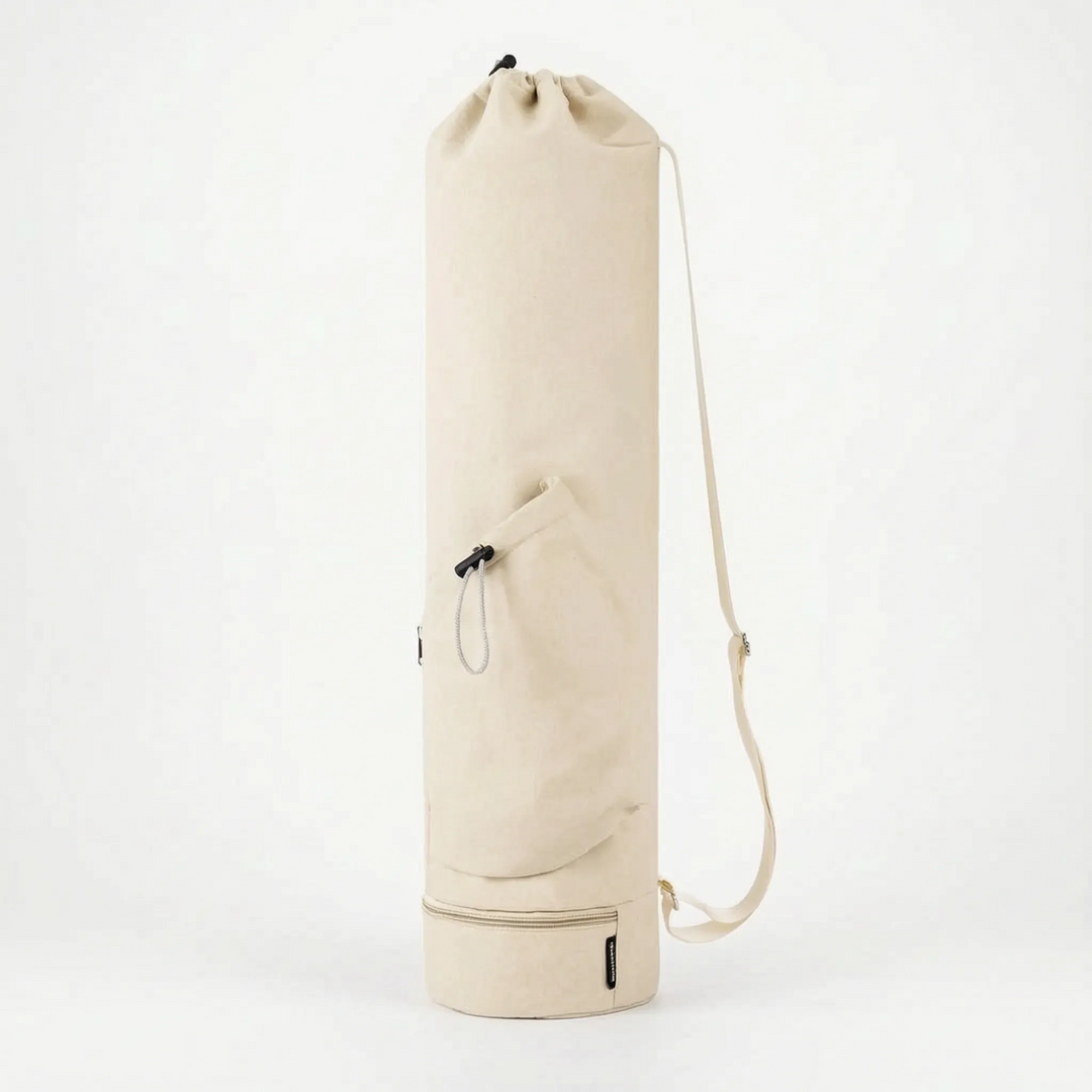 Practical nylon yoga mat bag with adjustable strap and storage pockets for all exercise gear.