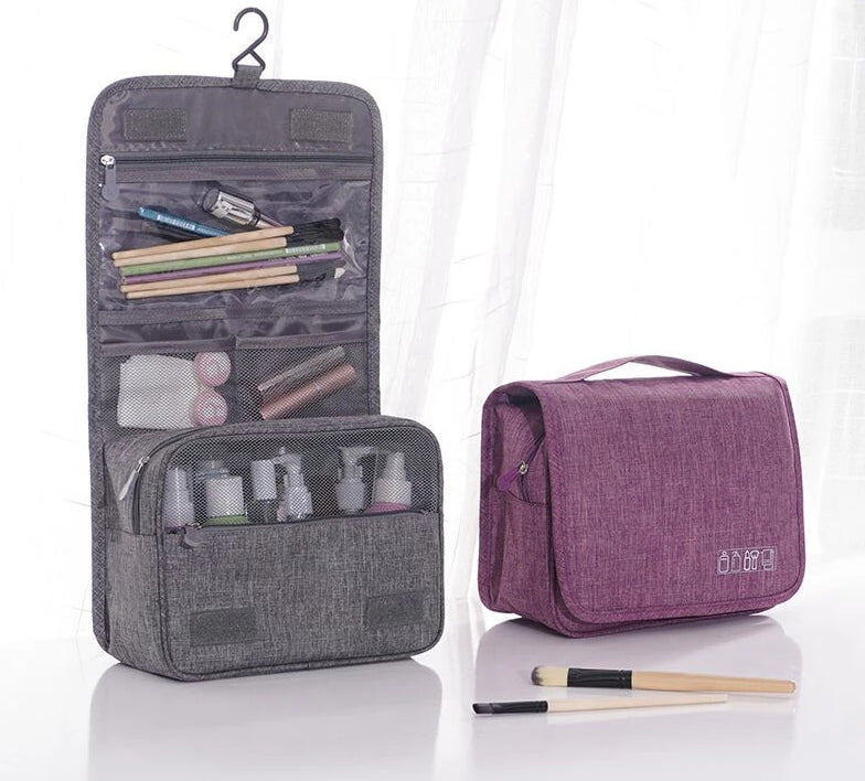Unisex hanging toiletry bag, waterproof, perfect travel organizer for hygiene essentials.