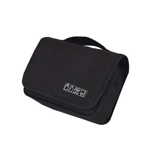 Portable deluxe travel organizer bag with multiple compartments for cosmetics, hygiene items.