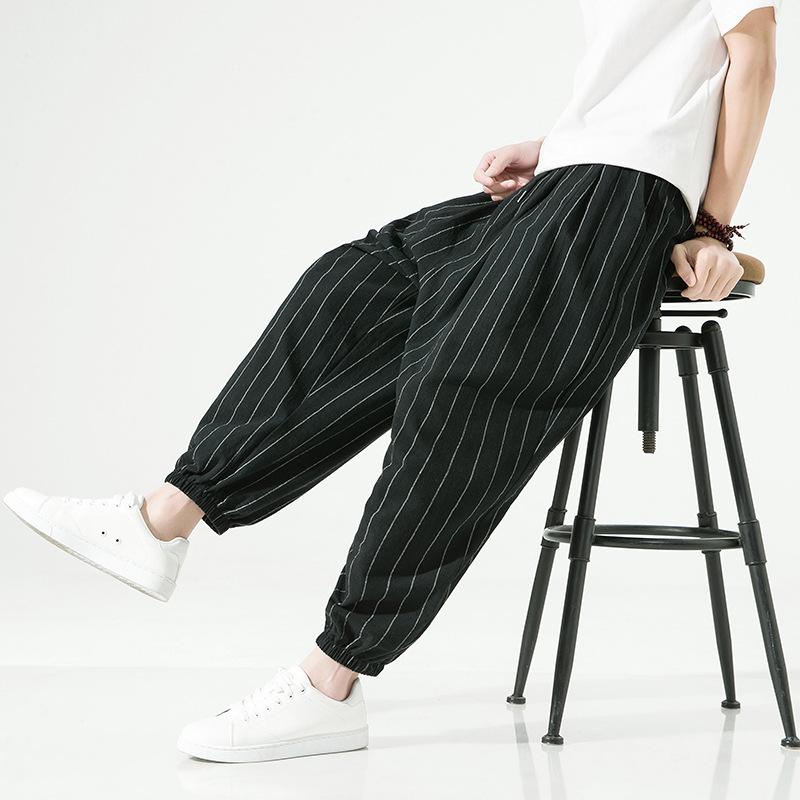 Relaxed fit linen blend pinstripe harem joggers for ultimate comfort. Unisex style with drawstring.