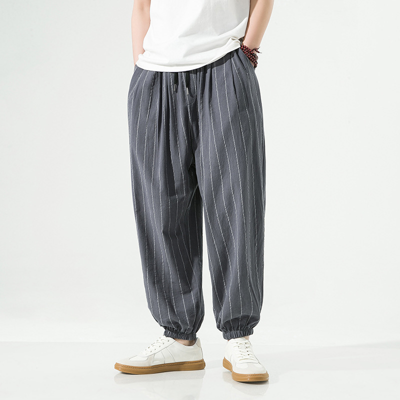 Stylish linen blend harem joggers for men and women. Casual pinstripe drawstring pants with relaxed fit.
