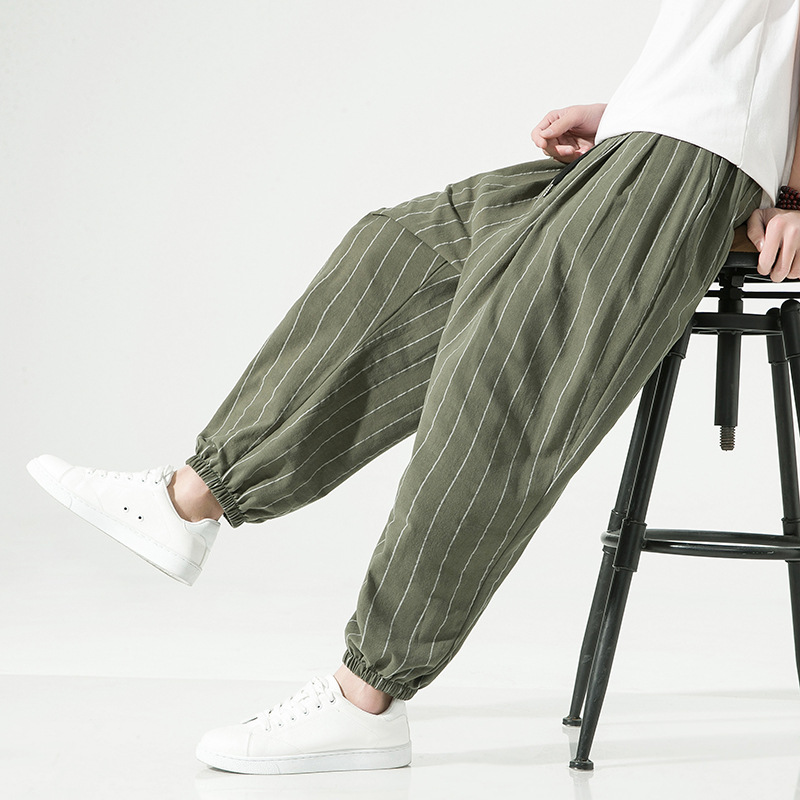 Pinstripe linen blend harem jogger pants. Unisex design, comfortable, and perfect for a relaxed style.