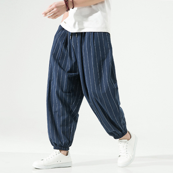 Drawstring unisex harem joggers. Comfortable linen blend pinstripe pants with a relaxed, stylish fit.