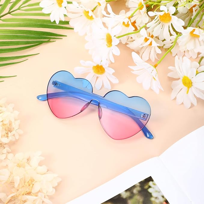 Transparent rimless heart sunglasses, showcasing their lightweight and contemporary design.