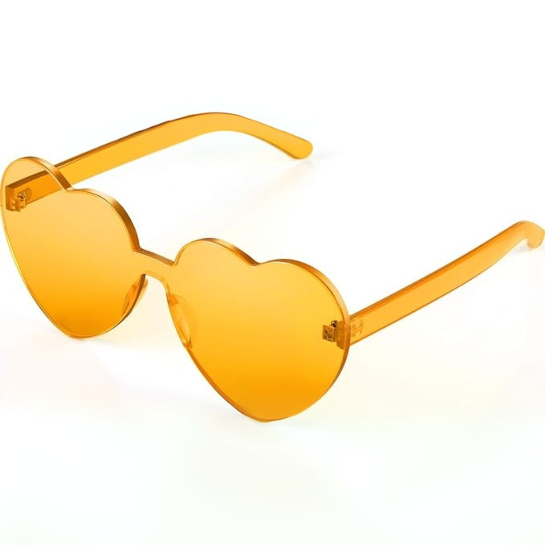 Fashionable heart-shaped sunglasses without rims, featuring clear transparent lenses for a trendy style.