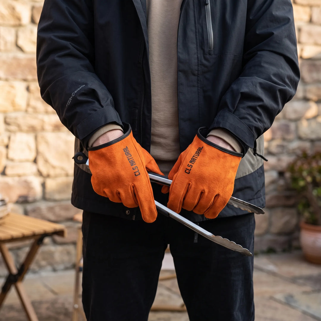 Unisex heat-resistant grilling gloves for BBQ, cooking, and outdoor fire pit use. Durable leather work gloves.
