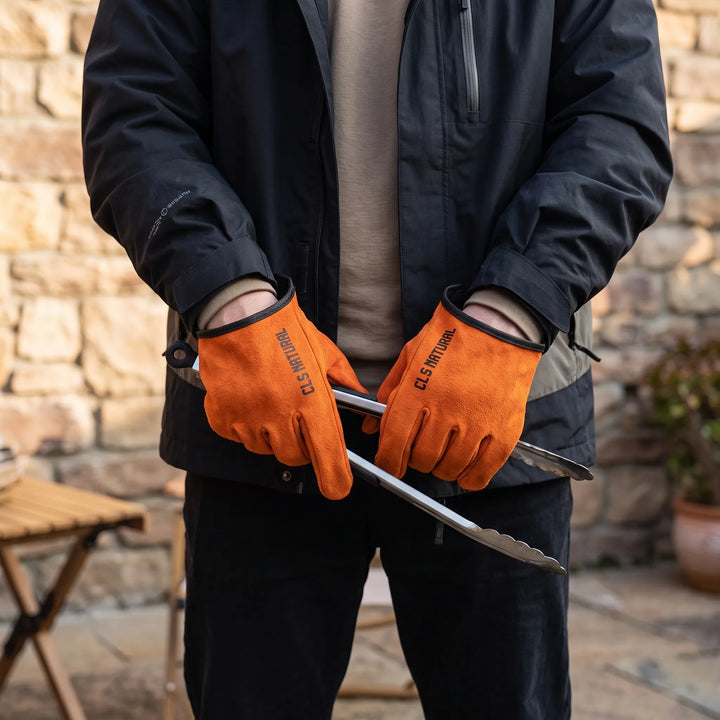 Unisex heat-resistant grilling gloves for BBQ, cooking, and outdoor fire pit use. Durable leather work gloves.