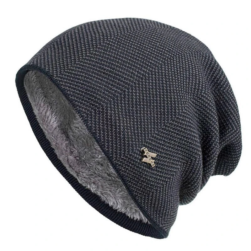Close-up of a warm herringbone beanie showing its textured knit and soft faux fur lining. Unisex winter hat.