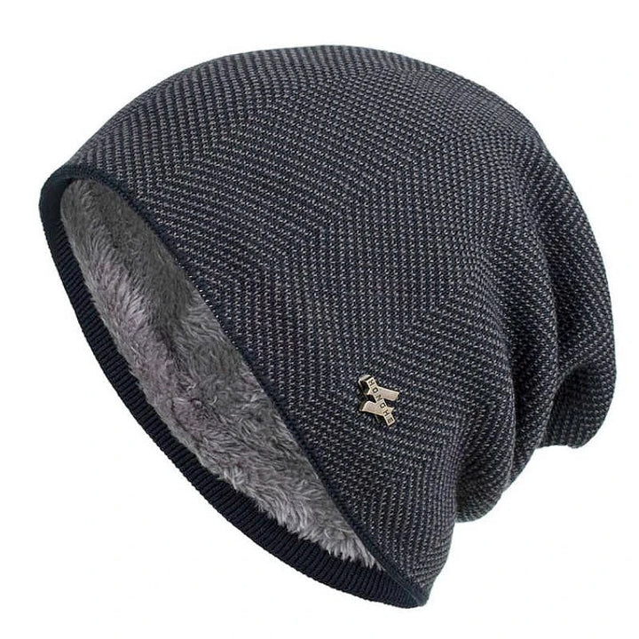 Close-up of a warm herringbone beanie showing its textured knit and soft faux fur lining. Unisex winter hat.