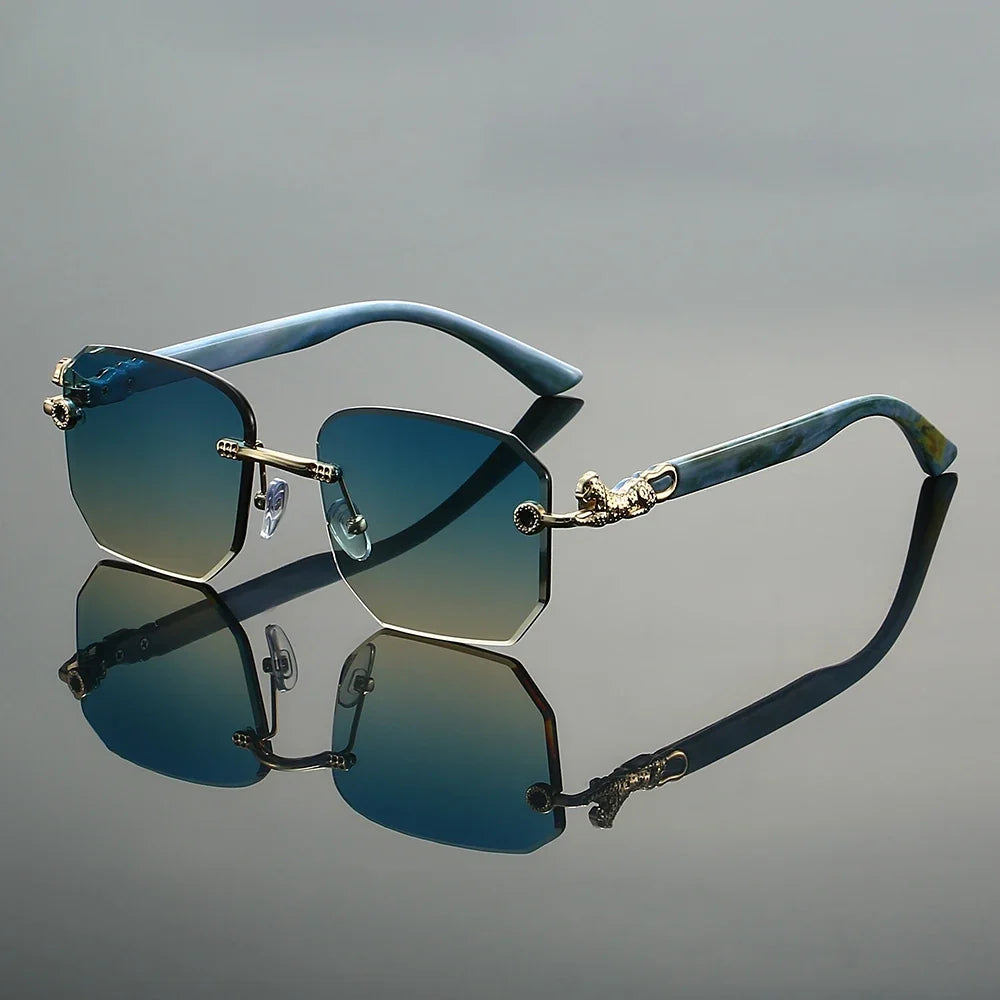Unisex hexagonal frameless luxury sunglasses with intricate golden dragon arms, offering UV protection.