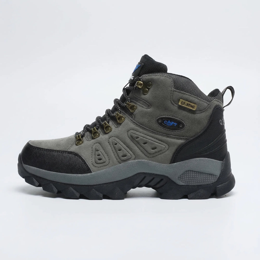 High-top lace-up hiking boots, unisex, with a rugged outsole & excellent ankle support for challenging trails.