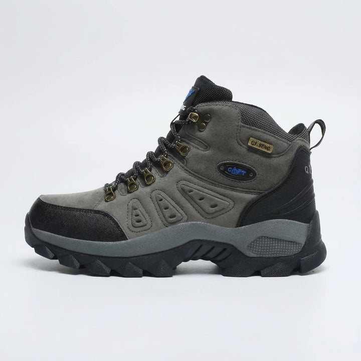 High-top lace-up hiking boots, unisex, with a rugged outsole & excellent ankle support for challenging trails.
