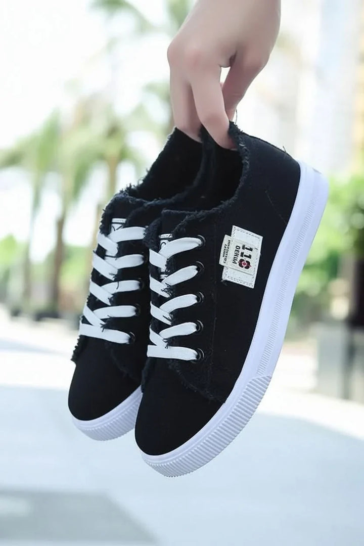 Comfortable blue high-top lace-up sneakers for men & women. Versatile everyday casual footwear.