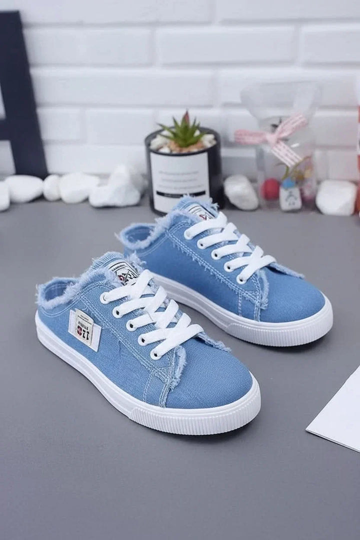 Modern blue high-top casual sneakers with secure lace-up closure, perfect for spring/summer fashion.