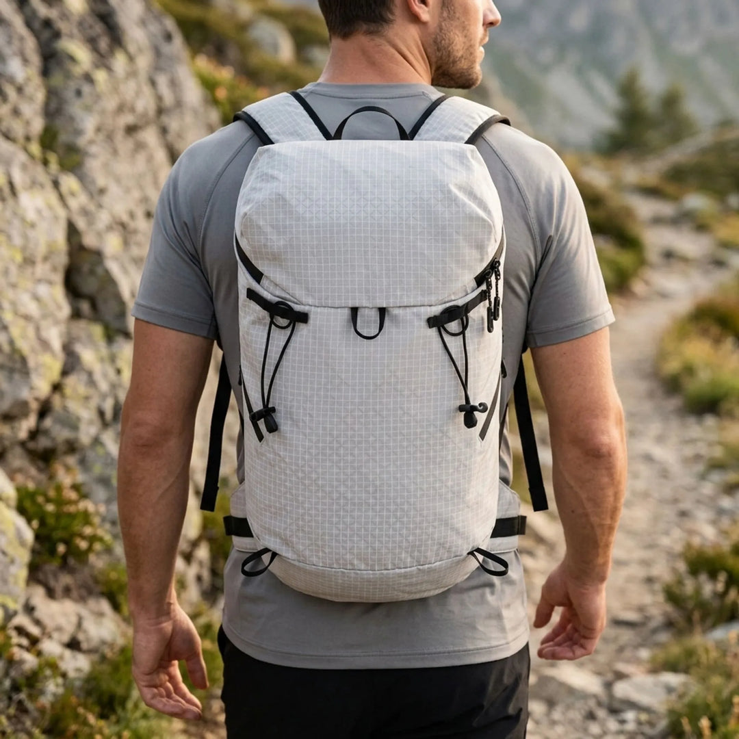 Unisex hiking backpack for outdoor adventures. Durable ripstop nylon daypack, perfect lightweight trail gear.
