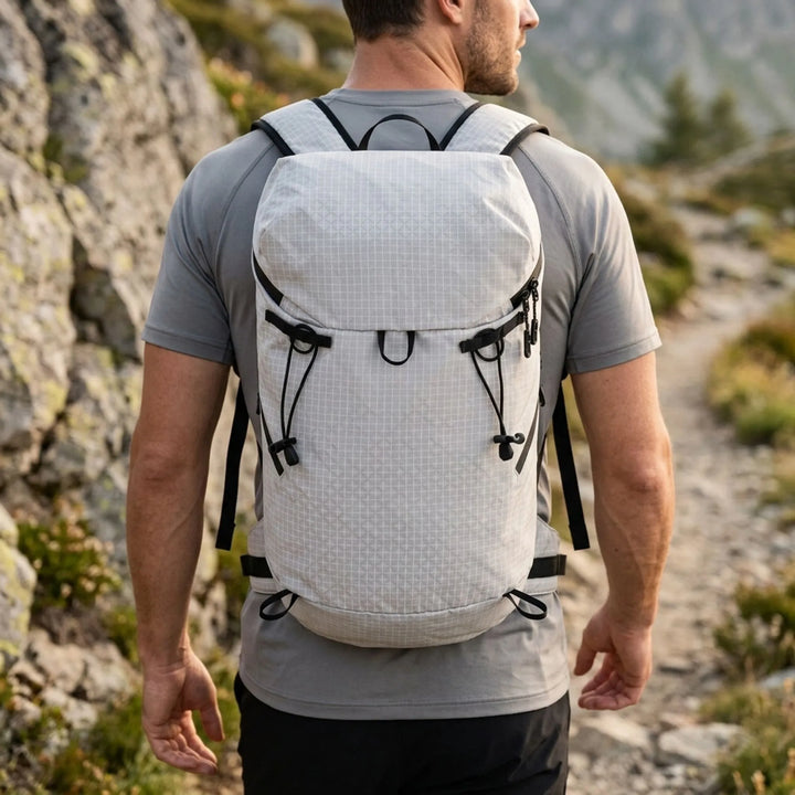 Unisex hiking backpack for outdoor adventures. Durable ripstop nylon daypack, perfect lightweight trail gear.