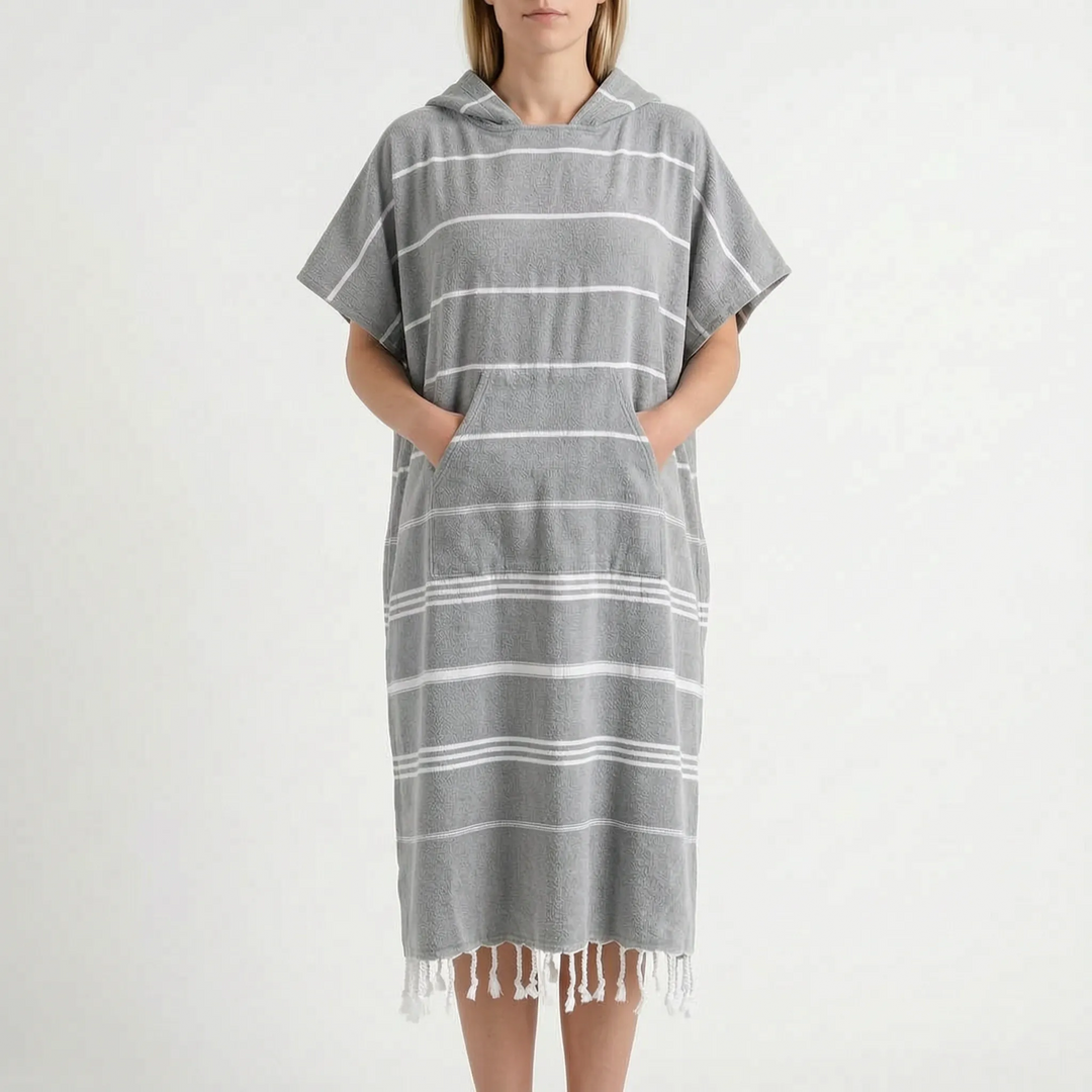 Stylish unisex hooded surf poncho, also functions as a quick-dry beach towel cover-up.