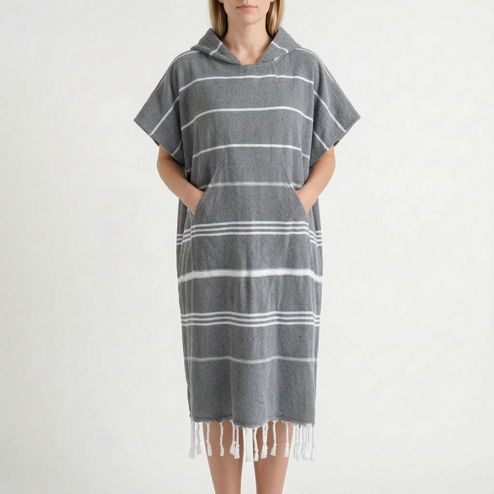 Hooded quick-dry changing poncho for surfers, swimmers, and beach enthusiasts.