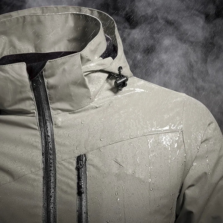 Advanced waterproof & windproof hooded technical jacket. Unisex design ensures all-weather protection for active outdoor wear.