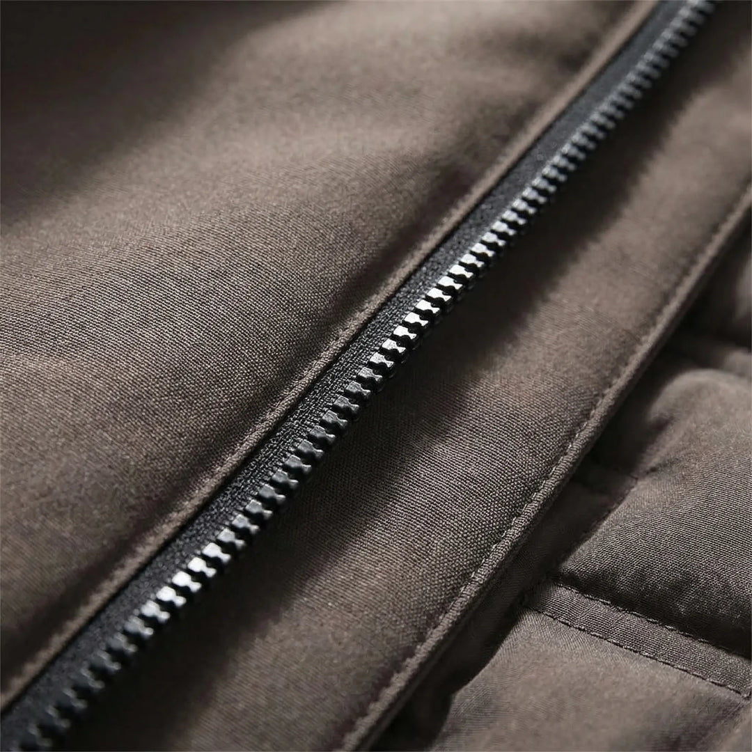 Stain resistant thermal hooded jacket for men & women. Essential insulated outdoor gear for adventure seekers.