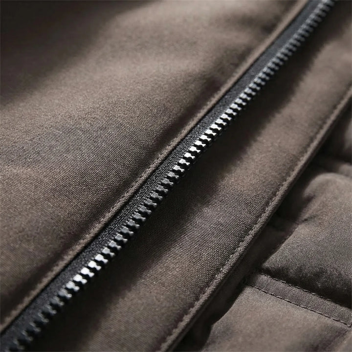 Stain resistant thermal hooded jacket for men & women. Essential insulated outdoor gear for adventure seekers.